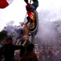 Paseo De La Reforma; Mexico City after Mexico's 3-1 victory over Croatia in the 2014 Fifa World Cup. People came from all around the city to dance and sing around Angel of Independence; the epicentre of the celebrations that continued into the evening. © Jared O'Sullivan 23/June/2014