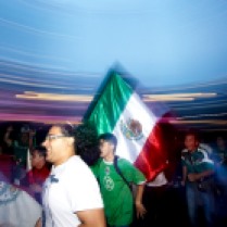 Paseo De La Reforma; Mexico City after Mexico's 3-1 victory over Croatia in the 2014 Fifa World Cup. People came from all around the city to dance and sing around Angel of Independence; the epicentre of the celebrations that continued into the evening. © Jared O'Sullivan 23/June/2014